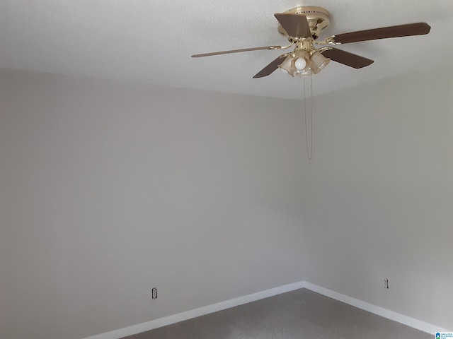 spare room with carpet flooring and ceiling fan