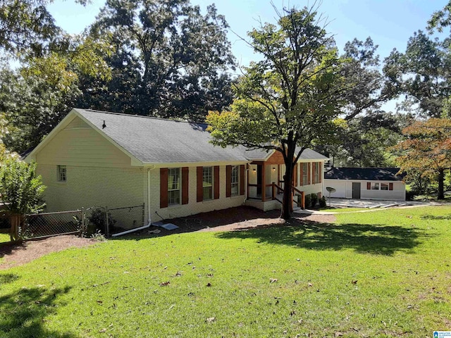 back of house with a yard