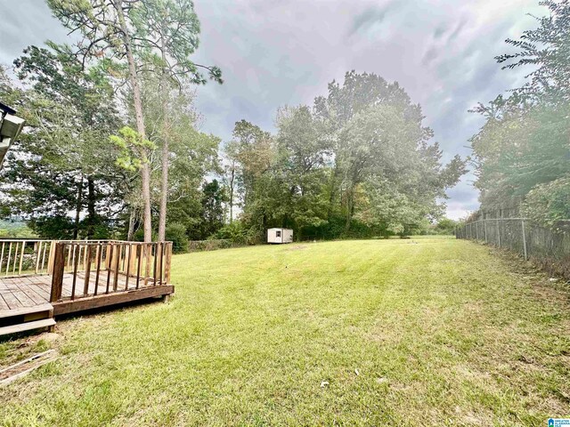 view of yard with a deck