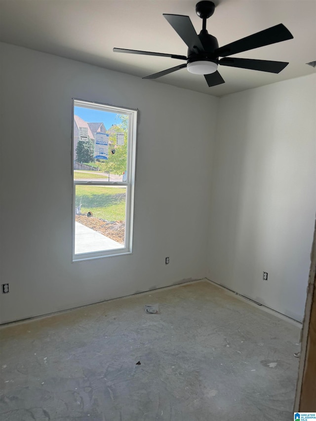 spare room with ceiling fan