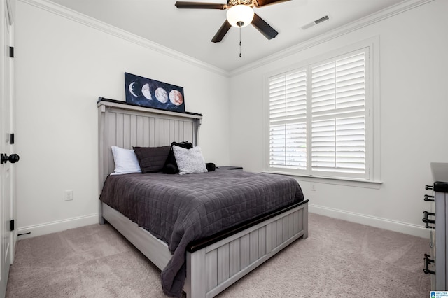 bedroom with ornamental molding, light carpet, and ceiling fan