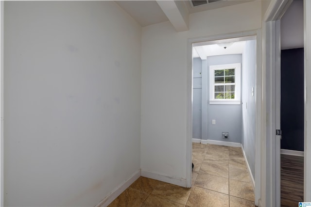 laundry room with light tile patterned floors