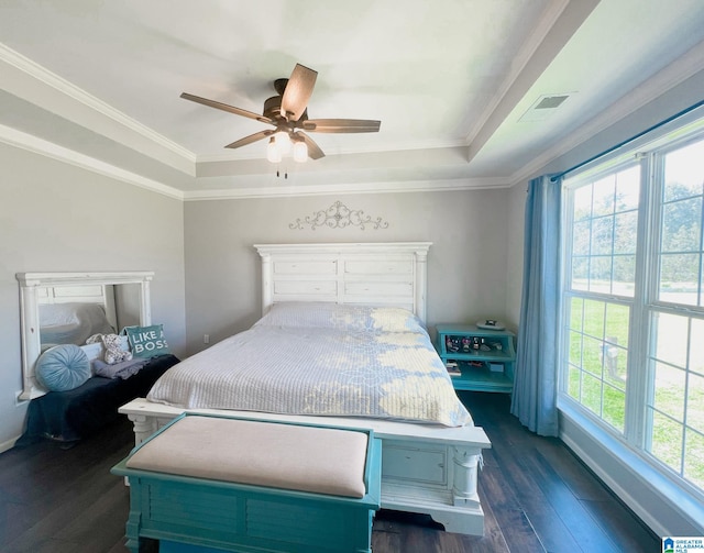 bedroom with multiple windows, crown molding, dark hardwood / wood-style flooring, and ceiling fan