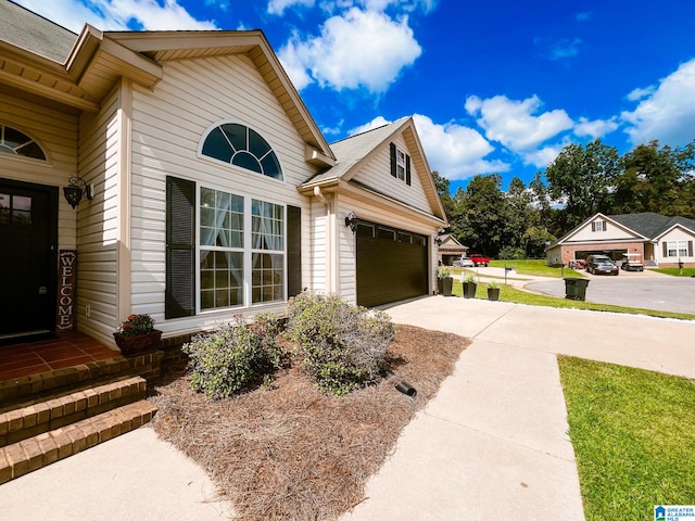 view of home's exterior with a garage