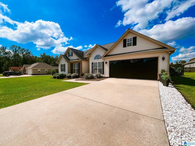 view of front of house with a garage and a front yard