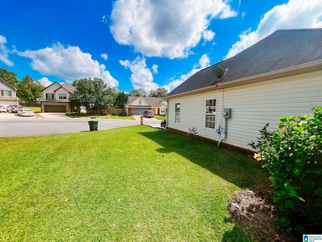 view of yard with a garage