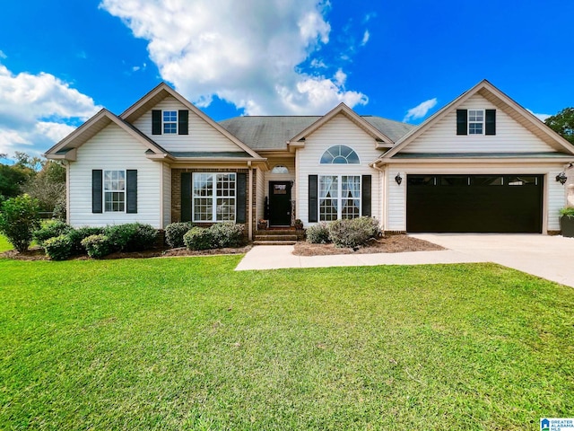 view of front facade featuring a front yard and a garage