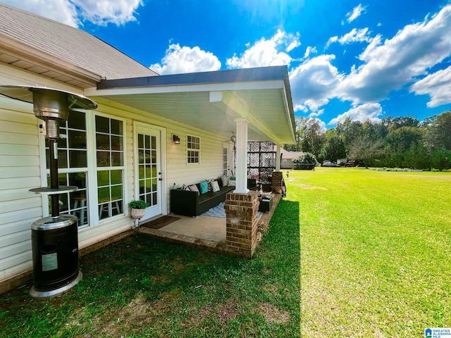 view of yard with a patio and outdoor lounge area