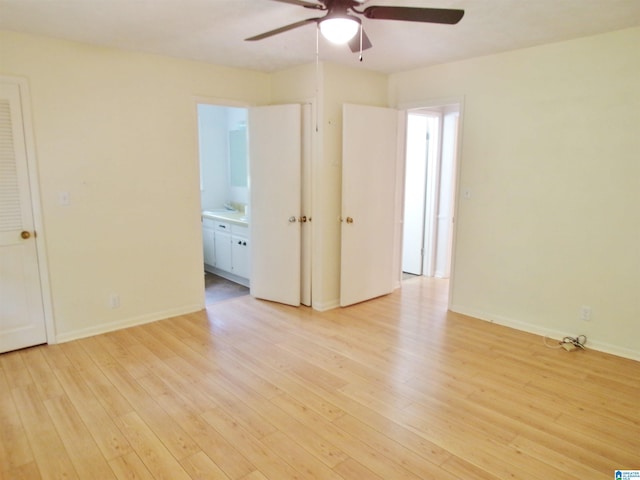 unfurnished room with light hardwood / wood-style flooring and ceiling fan