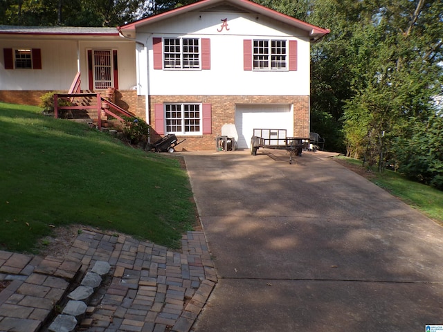 rear view of property with a lawn