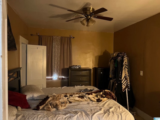 bedroom featuring ceiling fan