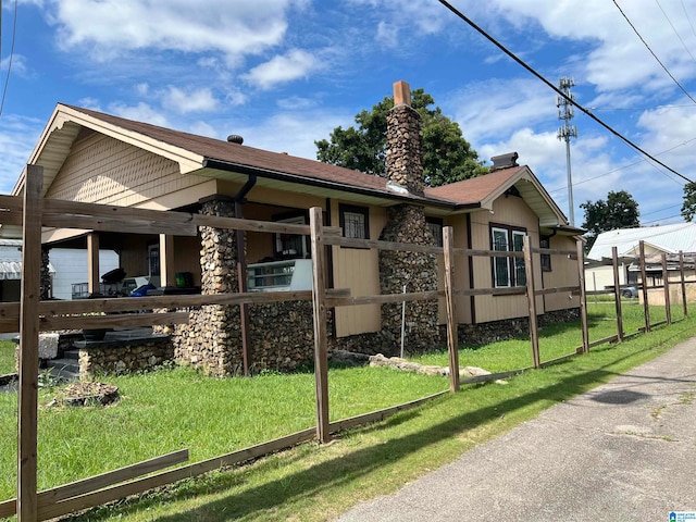 exterior space with a yard