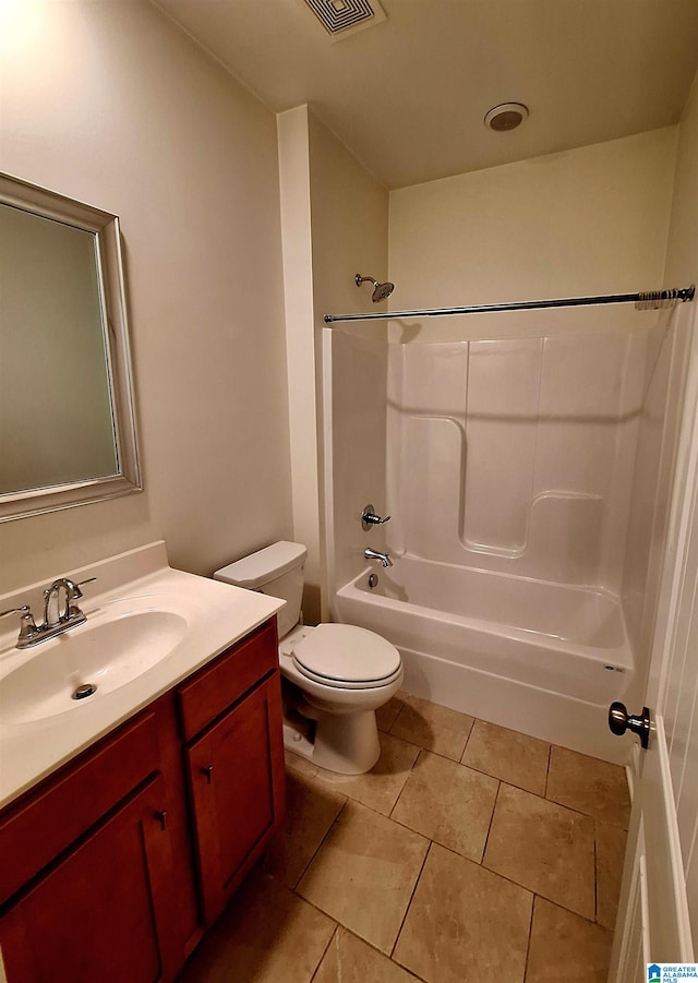 full bathroom featuring shower / tub combination, vanity, tile patterned flooring, and toilet