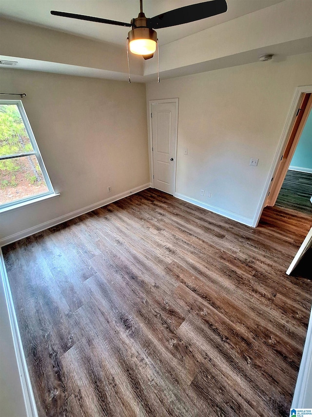 spare room featuring ceiling fan and hardwood / wood-style floors