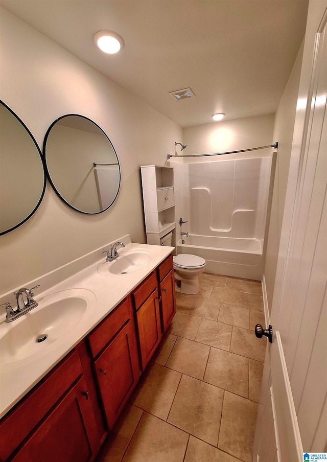 full bathroom featuring vanity, toilet, bathtub / shower combination, and tile patterned floors