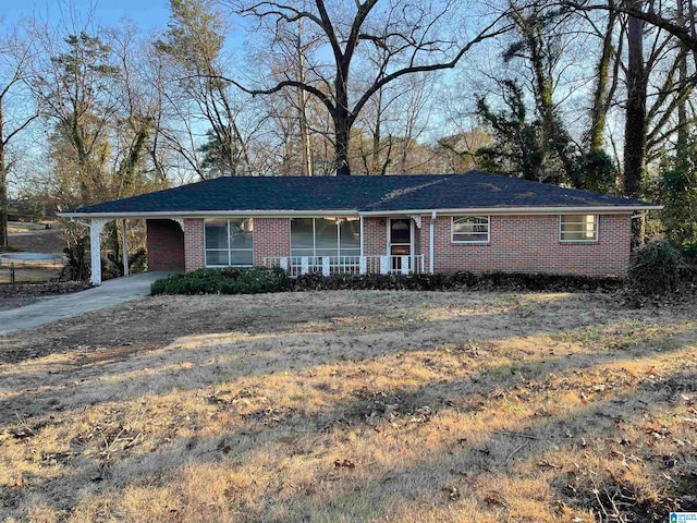 ranch-style home with covered porch