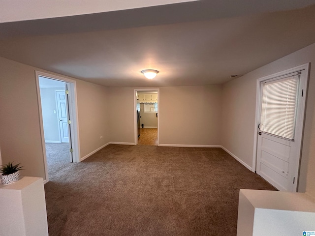 unfurnished room with carpet