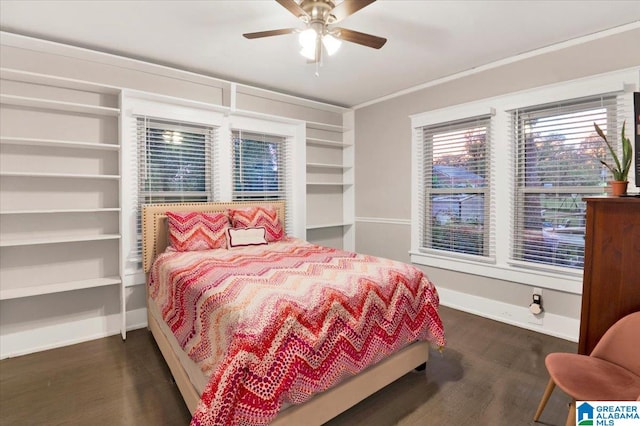 bedroom featuring ceiling fan and dark hardwood / wood-style floors