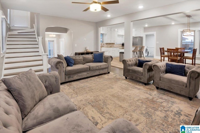 living room with ceiling fan