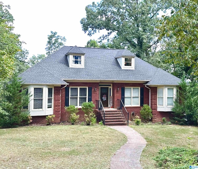 view of front of home with a front yard