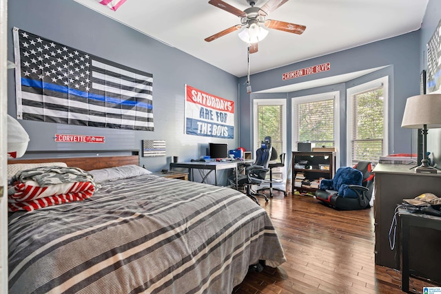 bedroom featuring dark hardwood / wood-style floors and ceiling fan