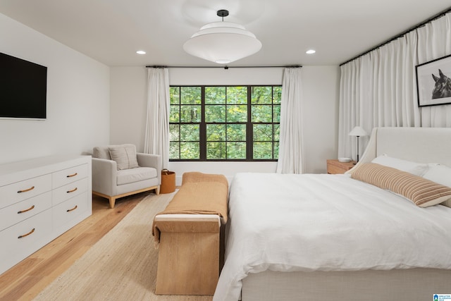 bedroom featuring light hardwood / wood-style floors