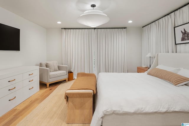 bedroom featuring light hardwood / wood-style flooring