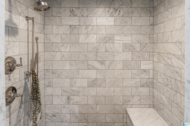 bathroom featuring tiled shower