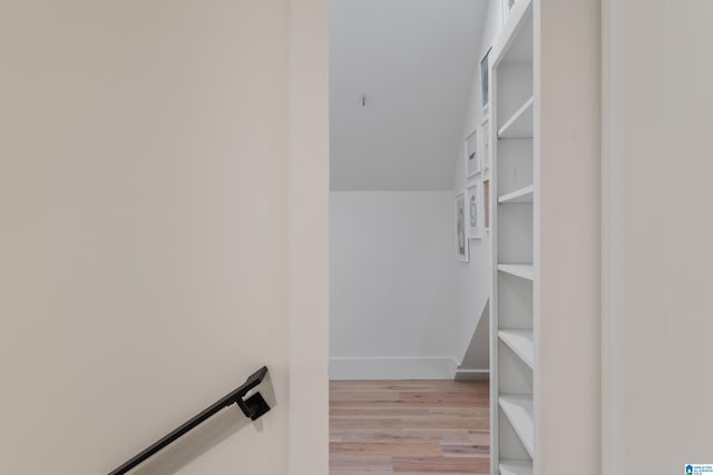 spacious closet featuring light wood-type flooring