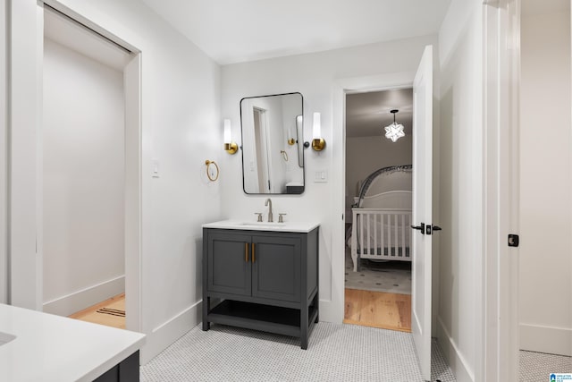 bathroom with tile patterned floors and vanity