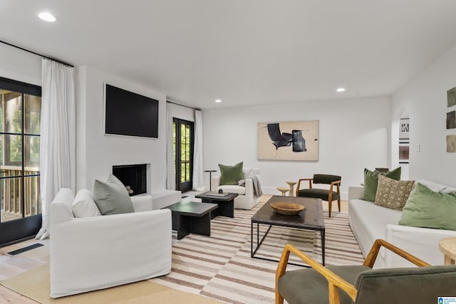 living room with light hardwood / wood-style floors