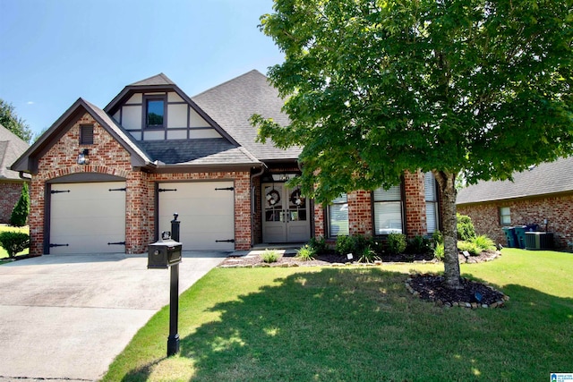 view of front of home featuring a front lawn and central AC unit