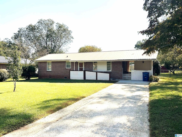 ranch-style house with a front lawn