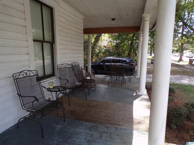 view of patio featuring a porch
