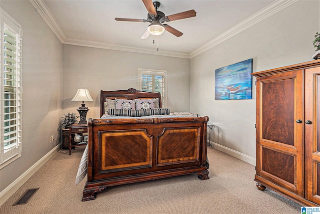 carpeted bedroom with multiple windows, ceiling fan, and crown molding