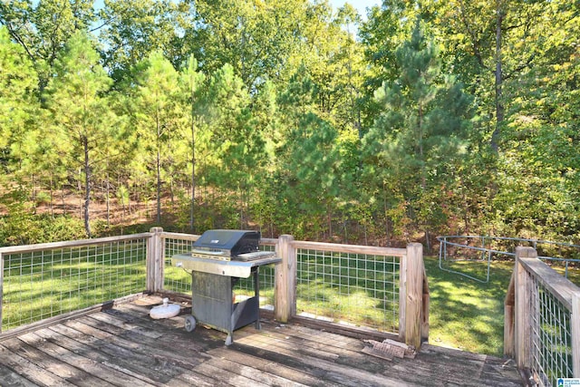 wooden deck featuring area for grilling