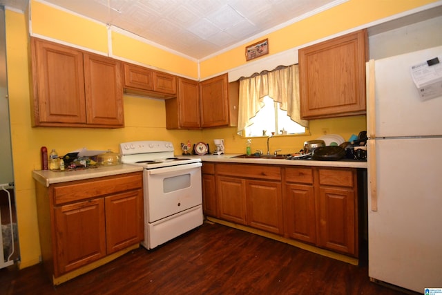 kitchen featuring sink, dark wood-type flooring, white appliances, and ornamental molding