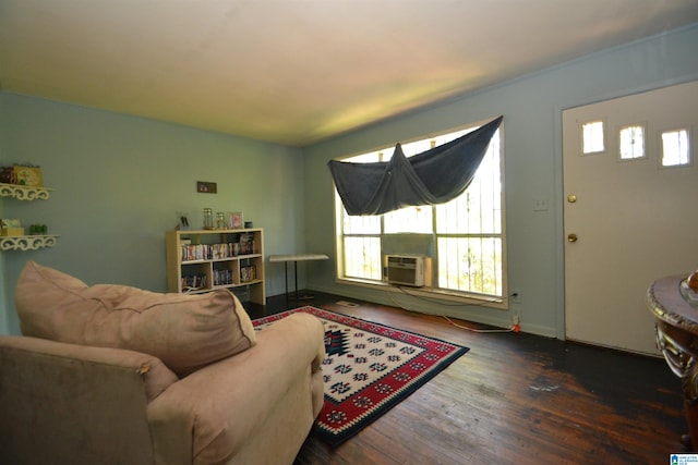 living room with dark hardwood / wood-style floors and cooling unit