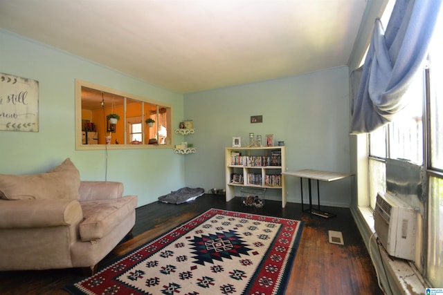 living room with dark hardwood / wood-style flooring