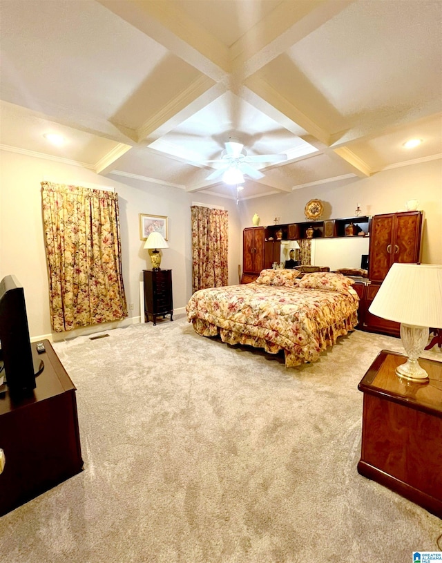 bedroom featuring beamed ceiling, coffered ceiling, light carpet, and ceiling fan