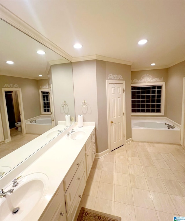 bathroom with vanity, crown molding, tile patterned flooring, and a washtub