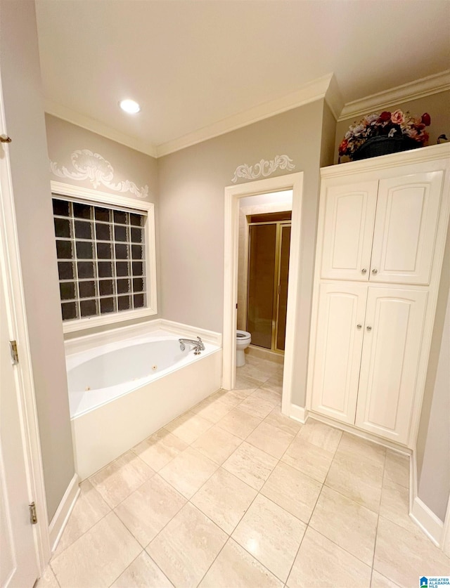 bathroom with tile patterned floors, crown molding, shower with separate bathtub, and toilet