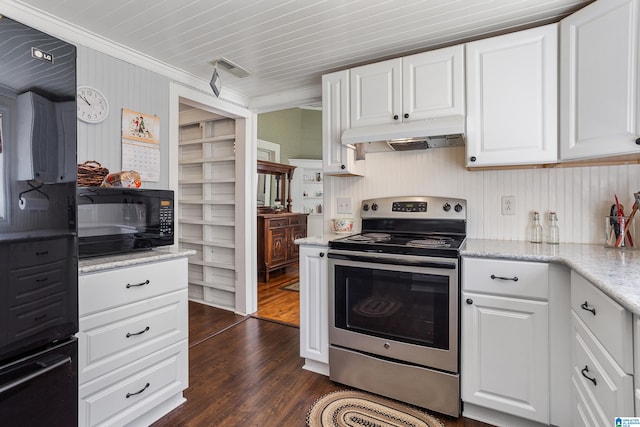 kitchen with light stone counters, dark hardwood / wood-style floors, white cabinets, electric stove, and ornamental molding