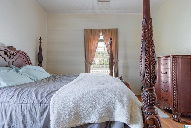 bedroom featuring wood-type flooring