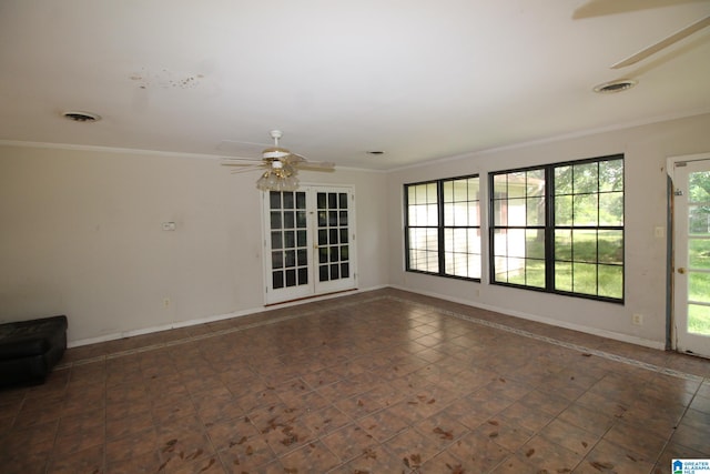 unfurnished room with french doors, crown molding, and ceiling fan