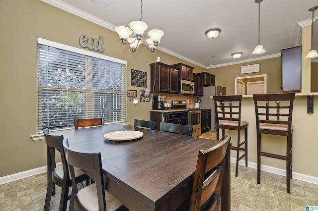 dining area featuring a notable chandelier and crown molding