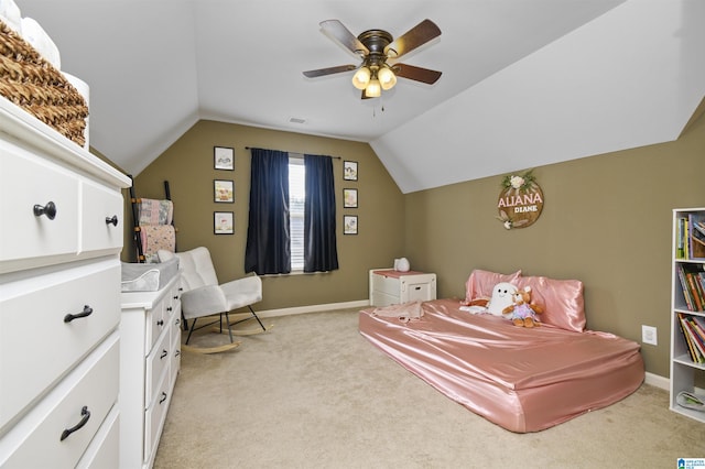 bedroom with vaulted ceiling, light carpet, and ceiling fan