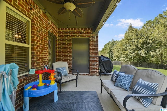 view of patio featuring a grill, ceiling fan, and an outdoor hangout area