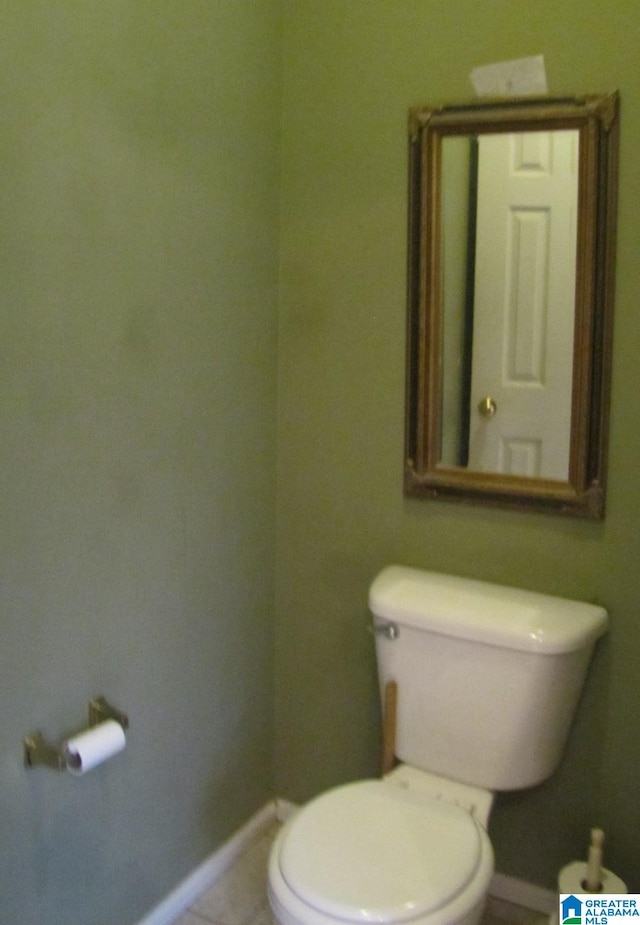 bathroom featuring toilet