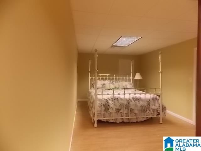 bedroom featuring hardwood / wood-style floors